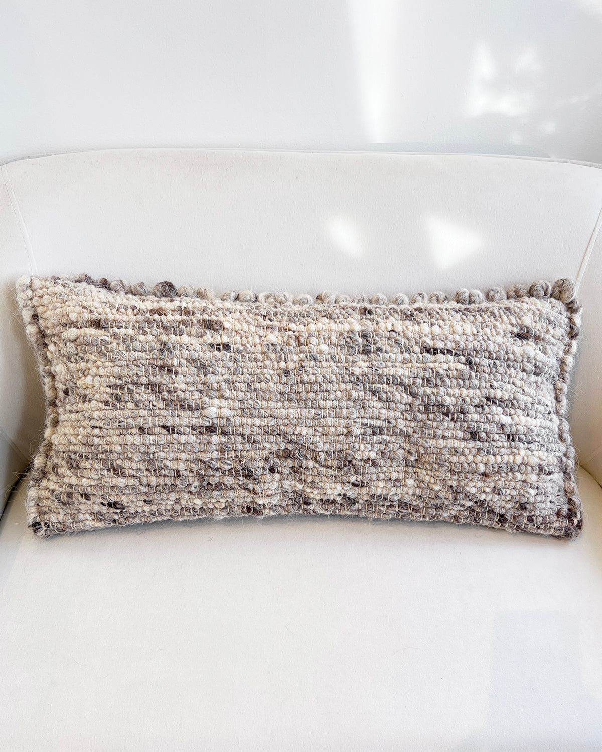 Fatima Bobble Throw Pillow in Gray