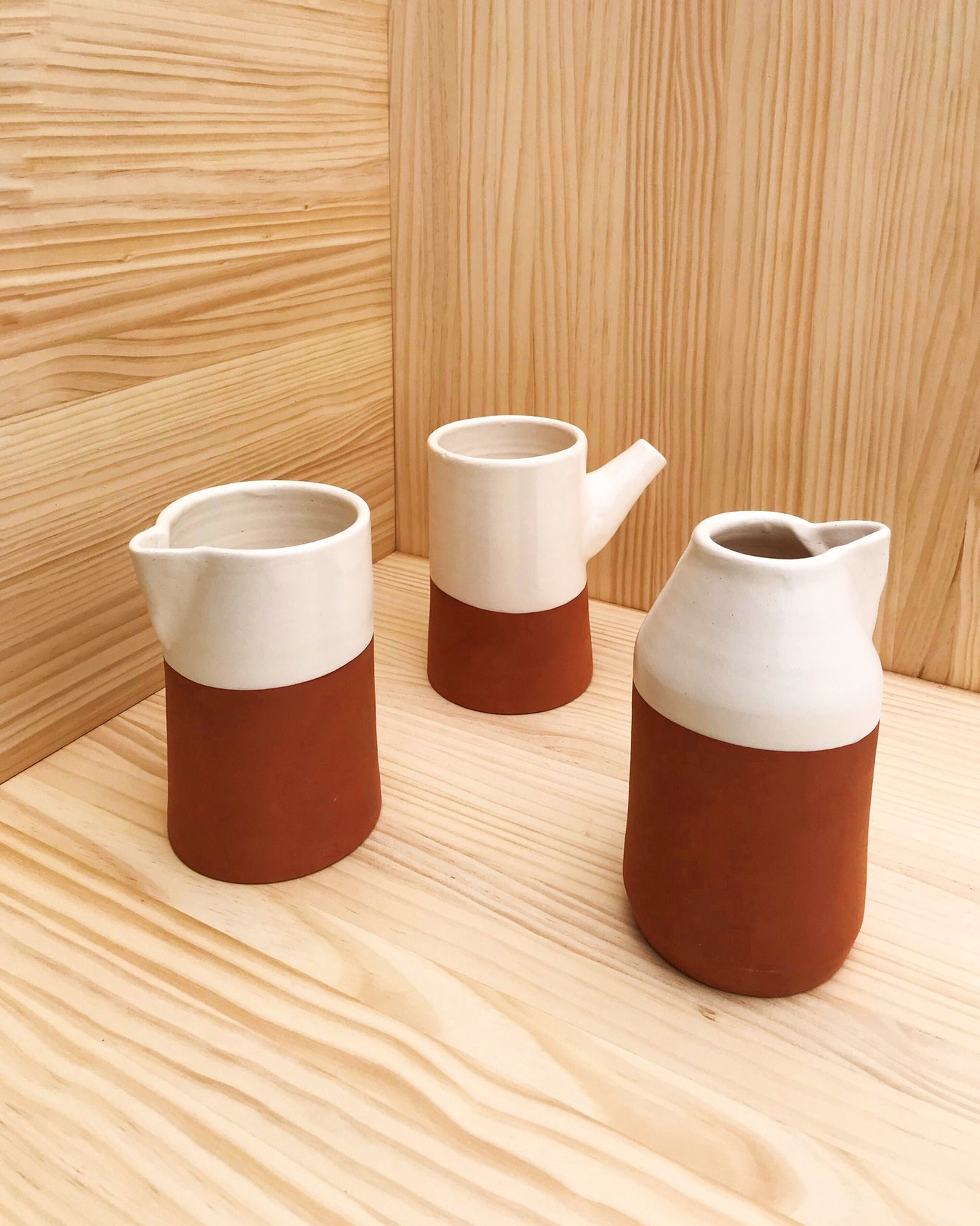 Handmade ceramic carafes terracota and white