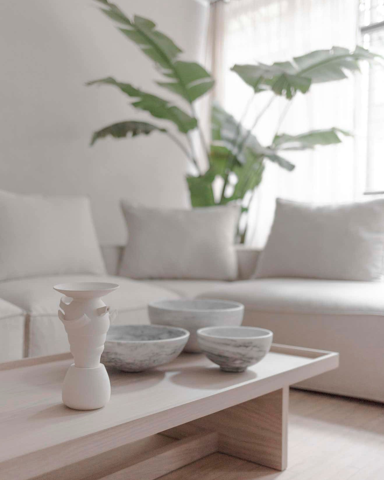 Group of white marble bowls in the three available sizes.