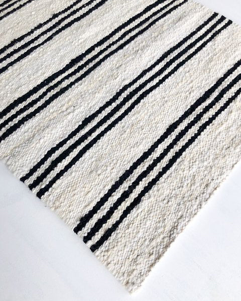 Handwoven wool rug black and white