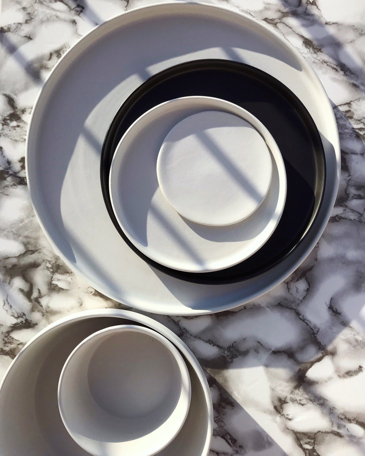 Handmade ceramic plates matte glaze black and white