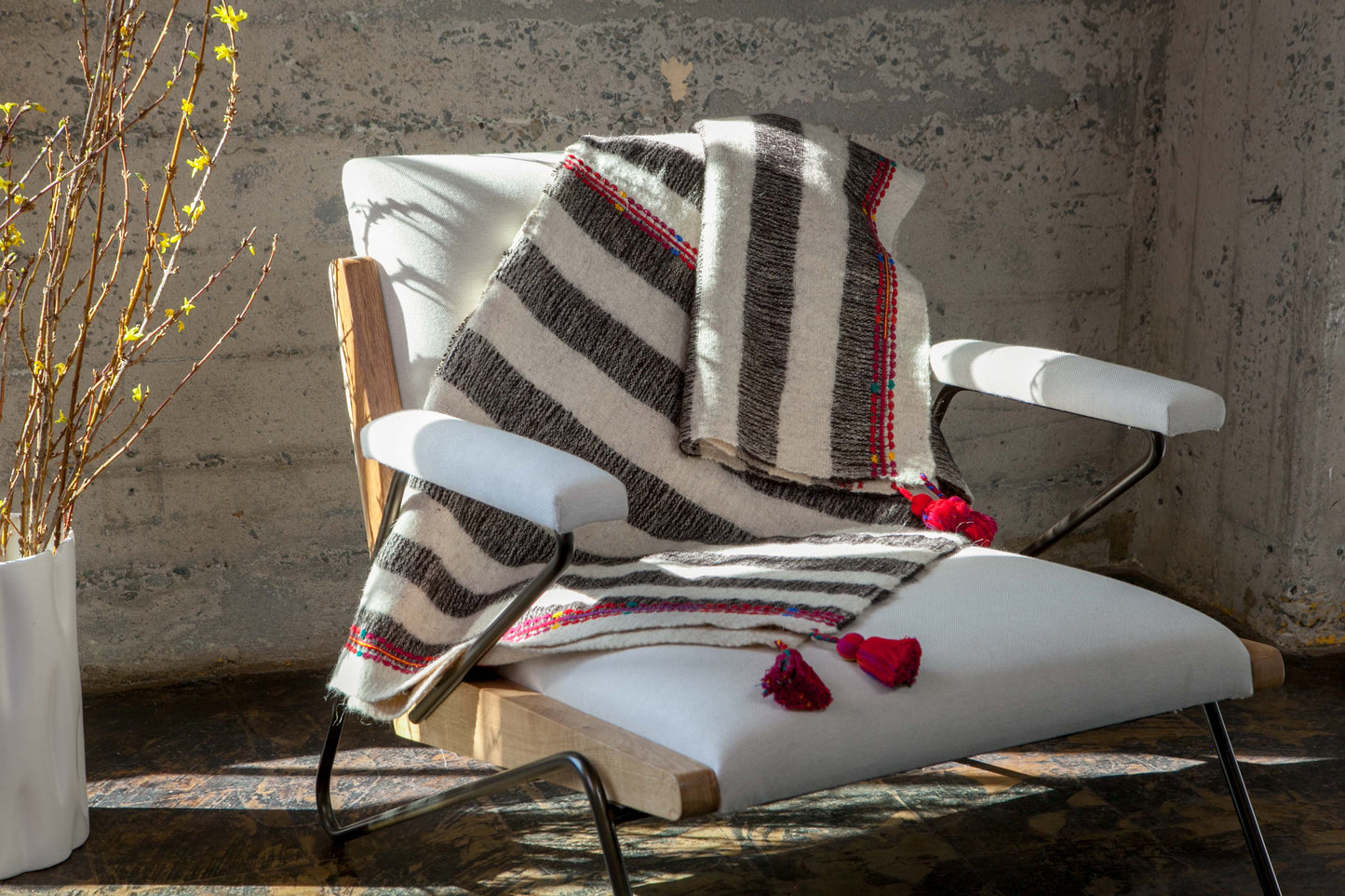Handwoven wool throw with red tassels black and white stripes