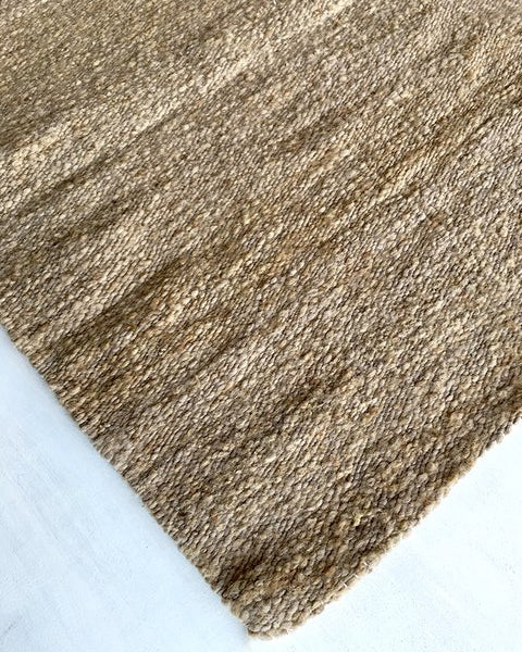 Handwoven wool rug brown