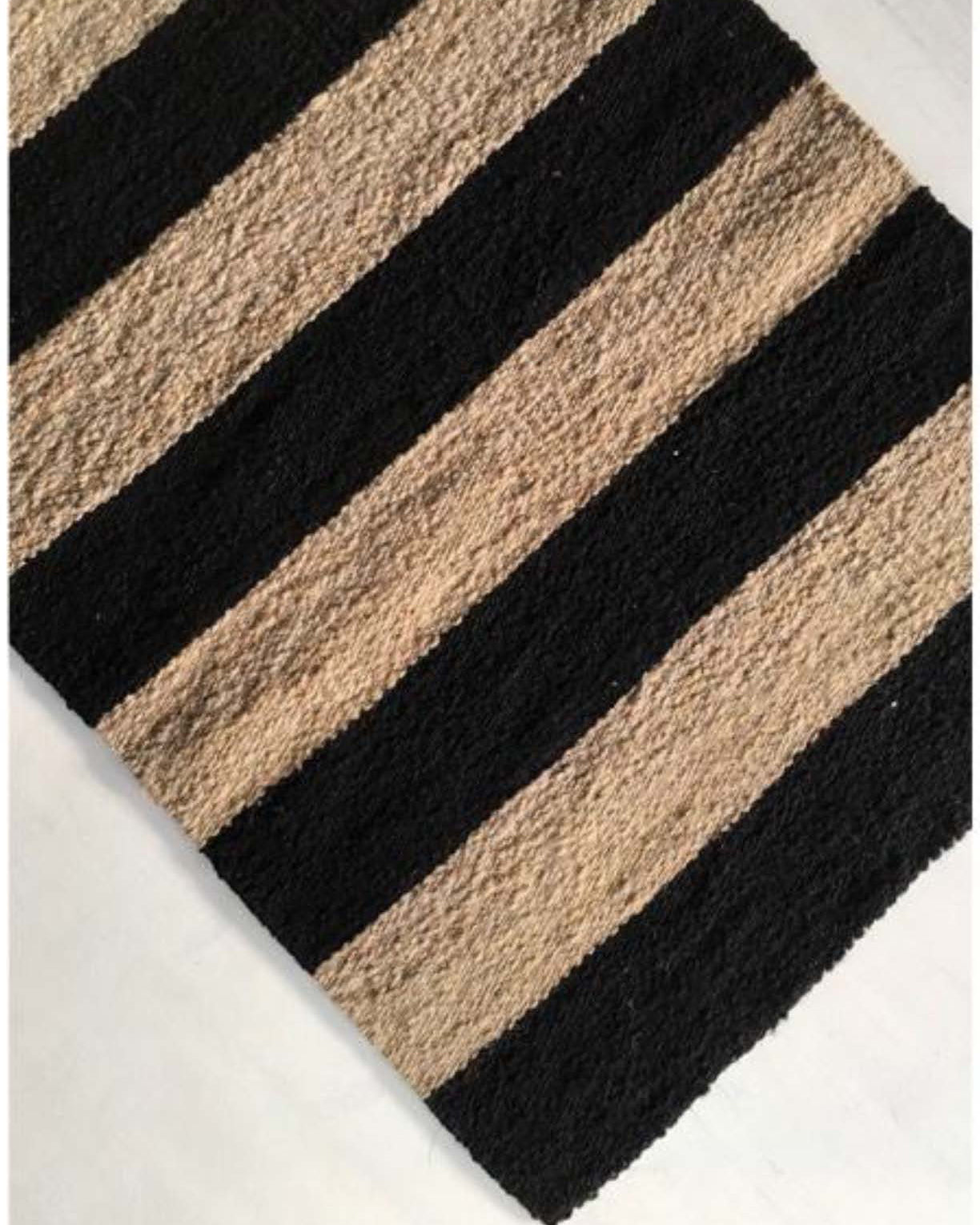 Handwoven wool rug black and beige