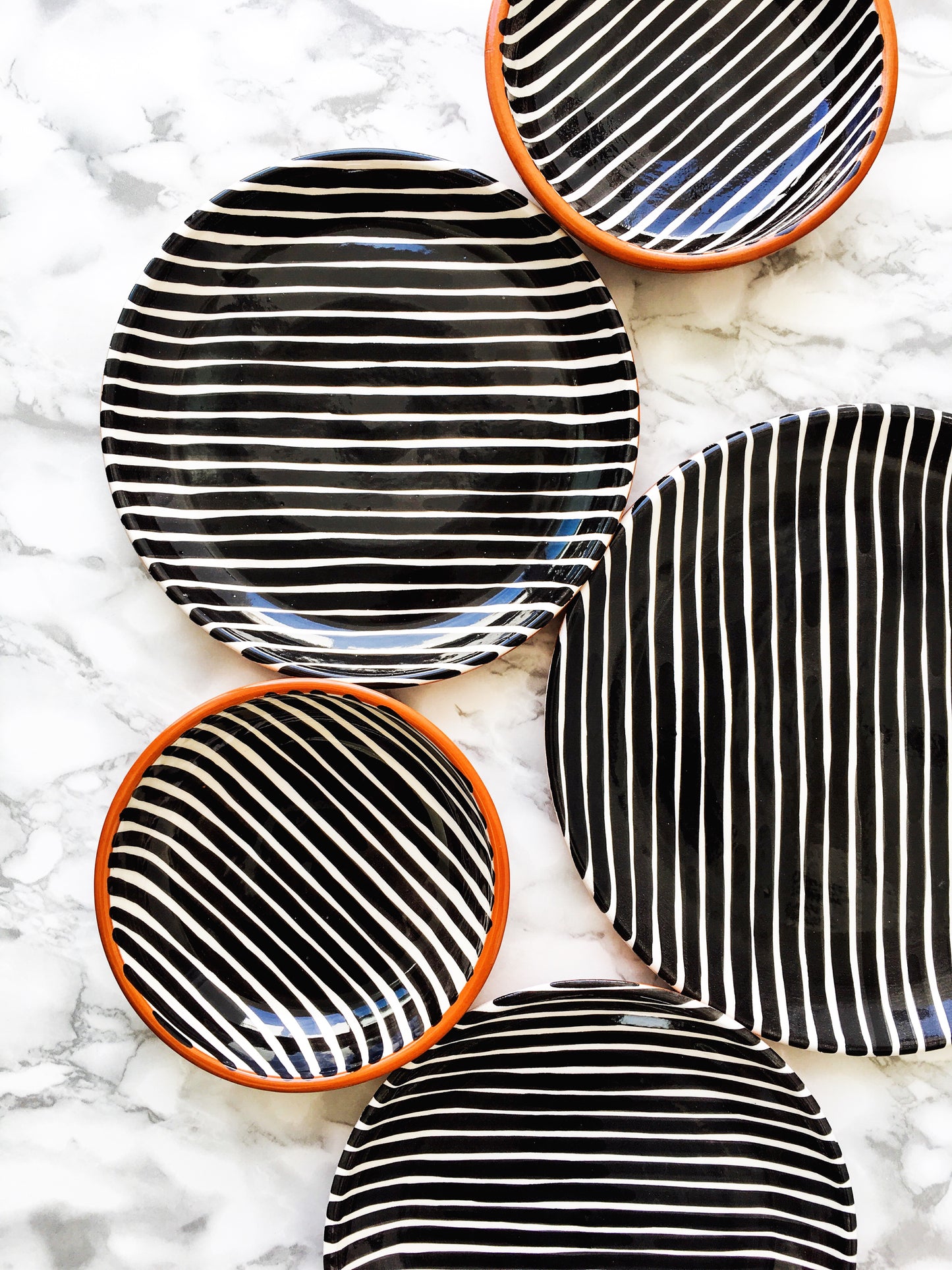 Stripe pattern dinner plate, salad plate, and bowl.